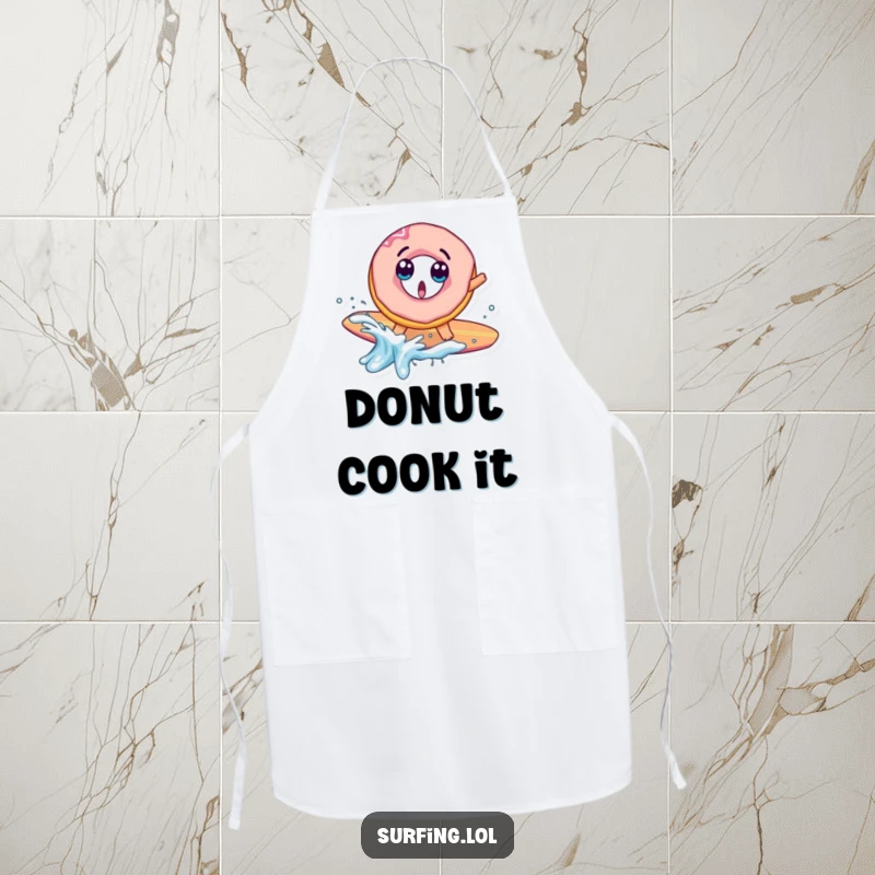 Funny apron showing a surprised donut character falling off a surfboard with a comical splash, bringing fun and silly vibes to cooking.
