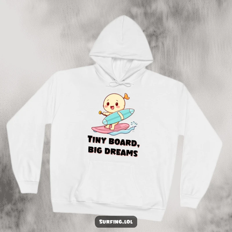 Funny hoodie depicting a cheerful character paddling with a miniature surfboard, embodying warmth and playful determination on a cool day.