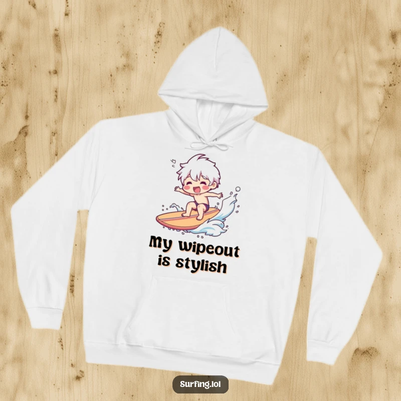 Funny Hoodie: A grinning character experiences a dramatic and comical surfboard wipeout, water flying in all directions.