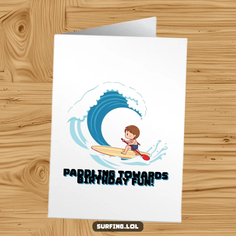 Funny Free Printable Birthday Card: Character happily paddling a surfboard towards an exciting breaking wave.